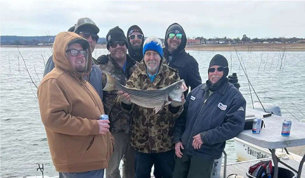 seven men caught a fish at Lake Buchanan